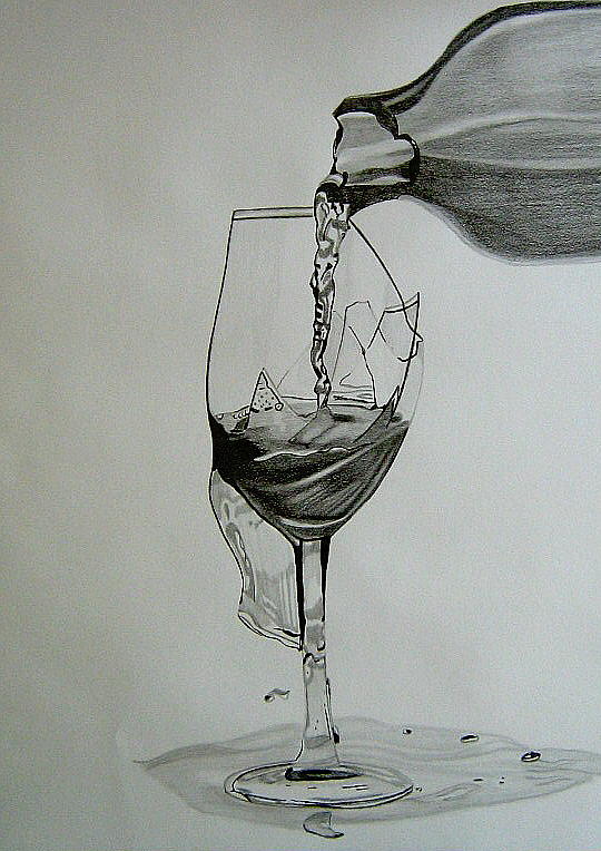 picture of a broken wine glass with wine spillig out